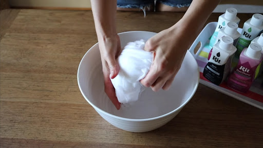 Damp your clothes before tie dying