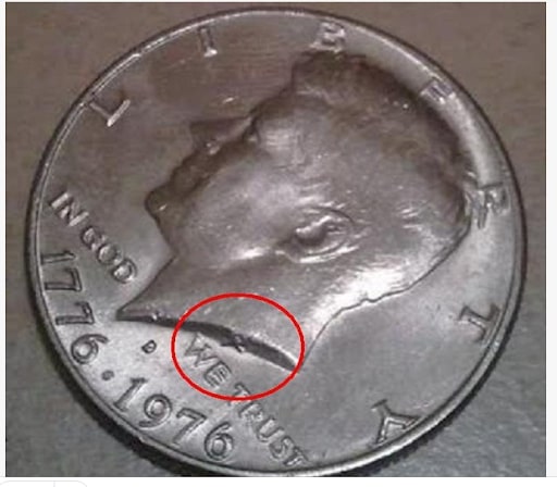 1971 Half Dollar Mark on Neck