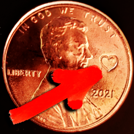 The 2021 Lincoln shield 1c cent penny with a love heart numismatic