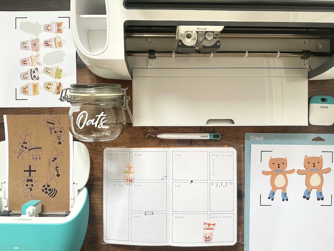 Flat lay of Cricut Maker and Cricut Joy with stickers