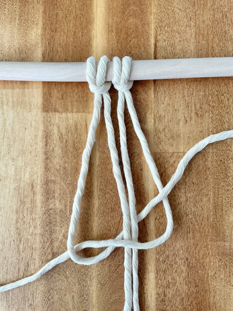 Thick Rope On A Wooden Column Forming A Knot As Part Of The