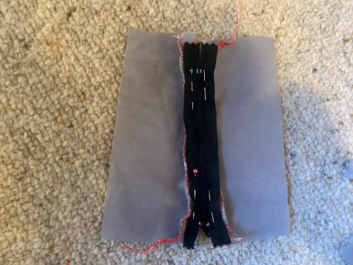 Pin the zipper on (optional)